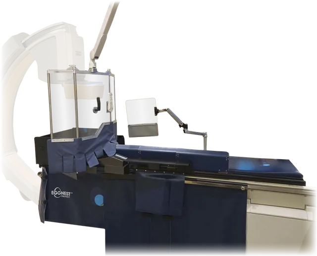 EggNest Complete: the Protect base and table skirt on a procedure table, with the Complete Flex shield hanging from a ceiling arm at the head of the table