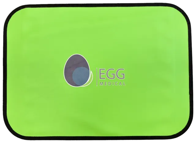 EggPad: a flat green pad with a black edge and the Egg Medical logo in the center